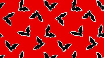 röd mönster med fladdermöss på en röd bakgrund. horisontell video