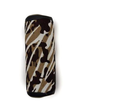 A brown and white speaker with a camouflage pattern, white background, copy space, flay lay, top view photo