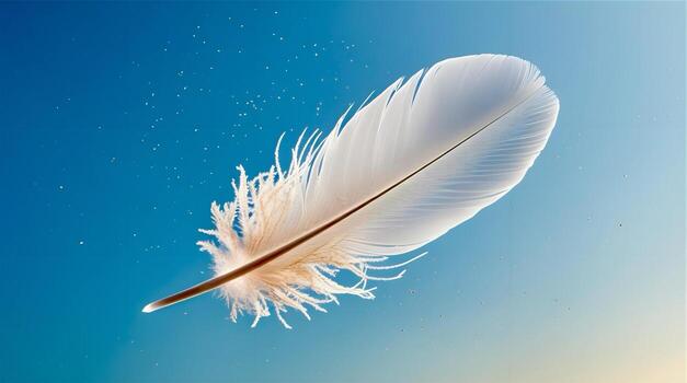 A white feather floating in the air photo