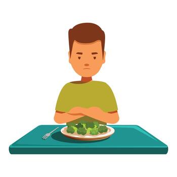 triste niño negarse a comer sano brócoli a mesa vector