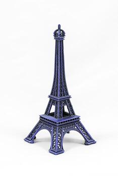 Blue Eiffel Tower model, isolated on white background photo