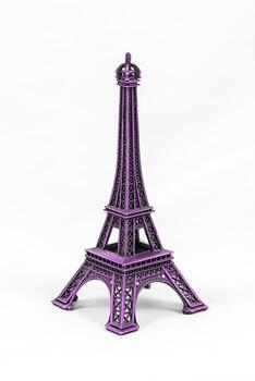 Purple Eiffel Tower model, isolated on white background photo
