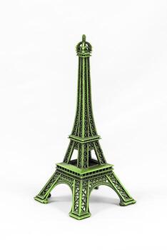 Green Eiffel Tower model, isolated on white background photo
