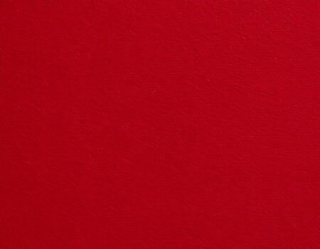 Close-up of deep red textured paper background with a pattern ideal for presentations photo