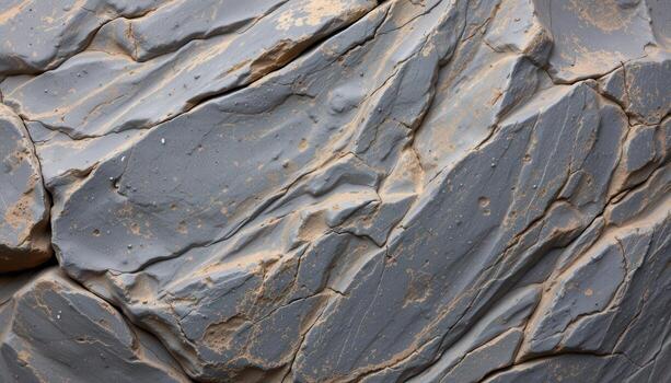Detailed Close-Up of Striated Rock Surface with Natural Texture and Color Variations photo