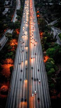 Traffic moves slowly on a freeway during the evening in Los Angeles photo