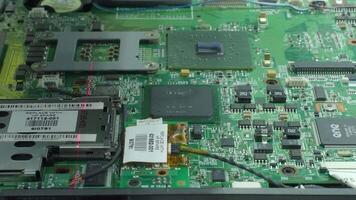 Laser scan for error close up of a computer motherboard. Scanning integrated circuits chips connectors and key components essential for data processing and system functionality in modern computer. video
