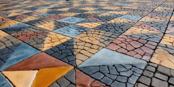 An eye-level perspective of a colorful and patterned geometric pavement design photo