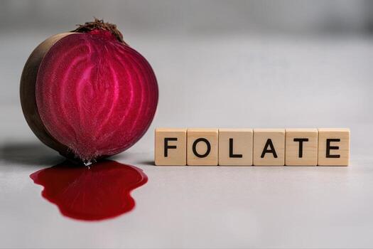 Nutrient Rich Beetroot Sliced with Folate Text Displayed, Highlighting Health Benefits and Nutritional Value in a Vibrant and Engaging Composition for Healthy Lifestyle Themes photo