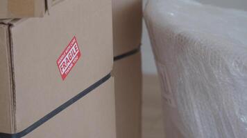 Careful handling of fragile packages in a delivery setting video