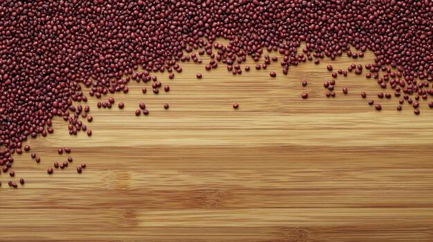 Red beans scattered on a bamboo surface photo