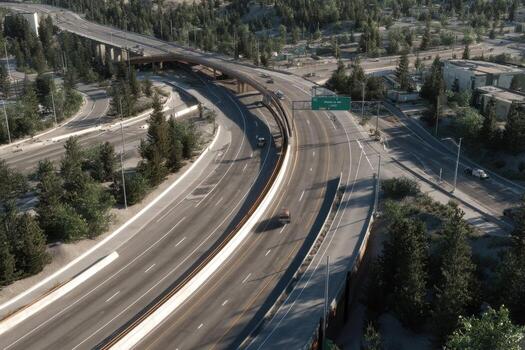 An aerial view of a freeway with cars on it photo