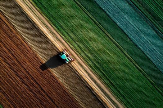 Aerial view of tractor in field photo