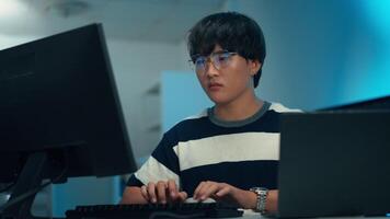 Programmer typing code with focus on software development video