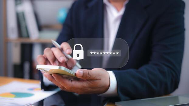 Cybersecurity concept with businessman holding smartphone and password login key icon. Online protection, data encryption, and mobile security. photo