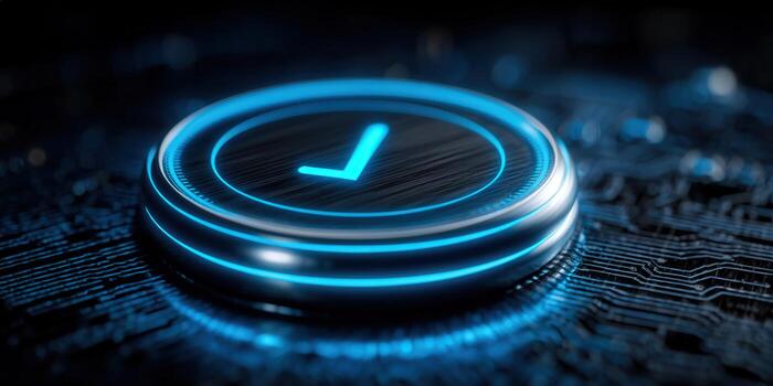 Close-up of a glowing checkmark button on a circuit board. photo