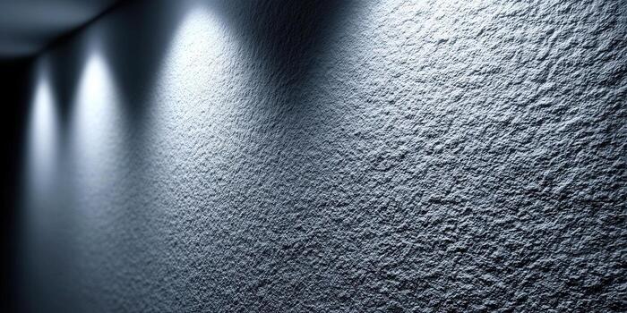 dramático Encendiendo Destacar el texturizado superficie de un hormigón muro, creando un temperamental ambiente foto