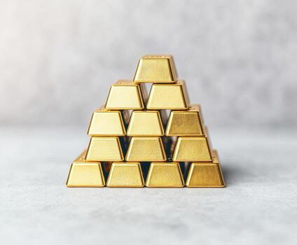 Stacked gold bars forming pyramid, symbolizing wealth and stability photo