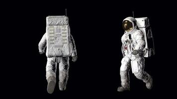 3d tolkning animation. två astronaut promenad på transparent bakgrund, alfa kanal, video