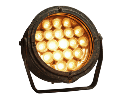 Vintage stage spotlight with multiple bright bulbs glowing warmly, isolated on transparency background, showing rustic metal frame and circular design emitting intense light png