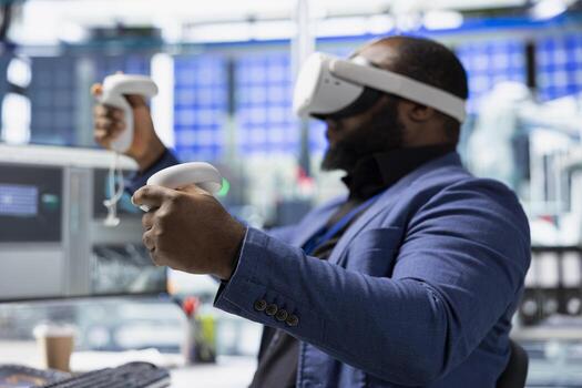 African american technician in solar panels plant using VR goggles, optimizing layouts using CAD software. Photovoltaics factory worker using virtual reality tech to do arrangements. photo