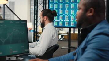 Female colleague bringing documents folders for general manager, assisting the team leader with stack of archived files. Secretary ensuring efficient organizational workflow. Camera B. video