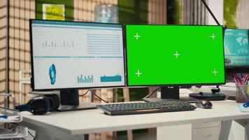 High end empty office displaying chroma key on pc monitor at desk, space prepared for professional administration and performance analysis to enhance business management and project success. video