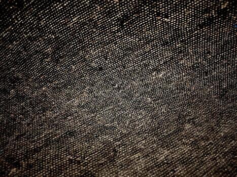 Dark Fabric Surface with Subtle Diagonal Weave and Fine Textured Threads background photo