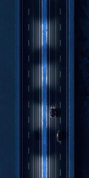 An aerial view of a highway at night photo