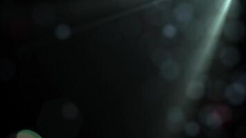 A dark abstract background with a soft bokeh effect and a subtle spotlight. Perfect for cinematic, atmospheric or dramatic overlays and motion graphics projects video