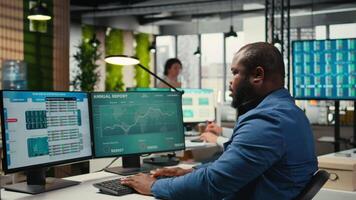 Female colleague bringing documents folders for general manager, assisting the team leader with stack of archived files. Secretary ensuring efficient organizational workflow. Camera A. video