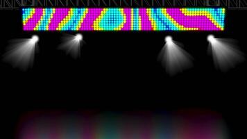 Bright LED screen with vibrant pixel pattern of diagonal waves and spotlights illuminating a dark background, ideal for concert stages, events, or club visuals, providing an empty space below. video