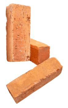 A vertical heap of three cracked old red or orange bricks isolated with clipping path in file format png