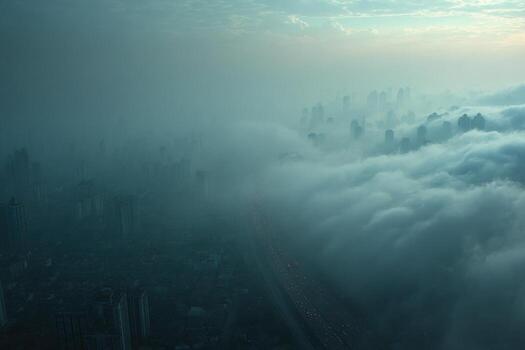 A city is covered in clouds and fog photo