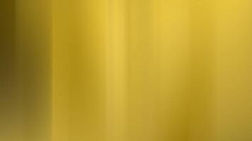 Vertical golden abstract background featuring soft light streaks and elegant gradient tones, ideal for premium branding, product display, or sophisticated digital visuals. video