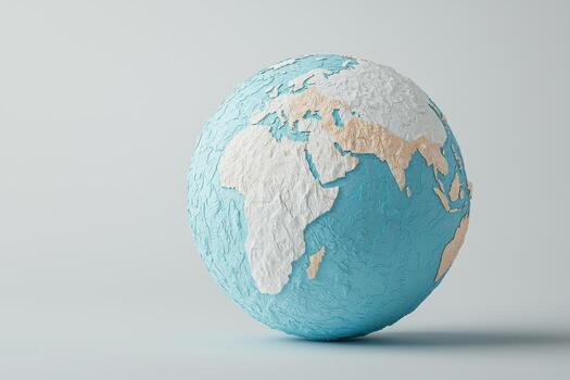 textured globe showing continents and oceans in blue and beige photo