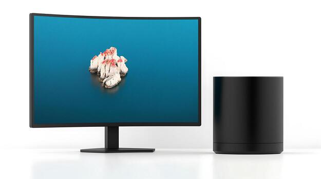 Modern workspace featuring a sleek monitor displaying a scenic island, with a minimalist design photo