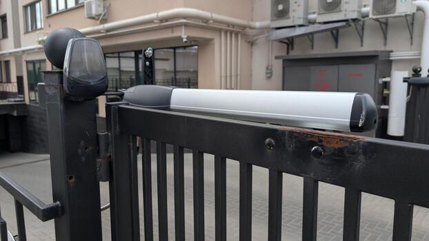 The Innovative Automated Gate Mechanism that is utilized in a Modern Facility Setting photo