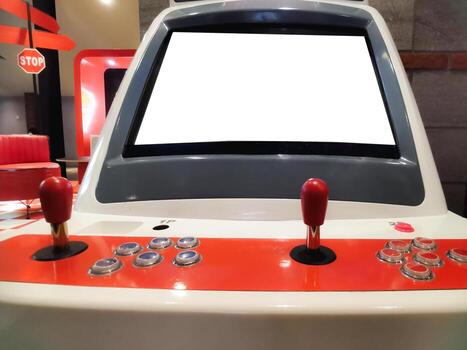 A retro arcade machine stands ready for a new generation of players. The clean white screen and bright red joysticks and buttons invite interaction, promising hours of engaging entertainment. photo