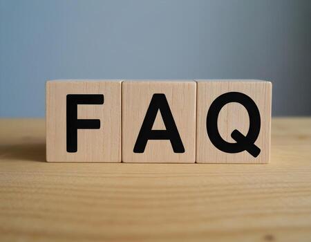 FAQ blocks on wooden surface photo