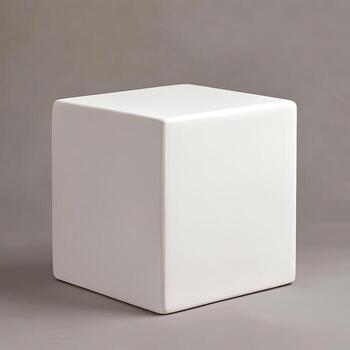 Clean white cube features rounded corners against a simple gray backdrop creating geometric harmony photo