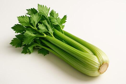 A bunch of fresh celery on a white background, emphasizing its brightness and naturalness. The perfect image for culinary drains and healthy eating. photo