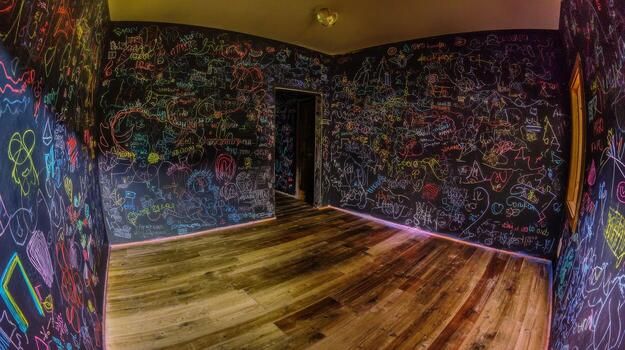 image of room with colorful graffiti on the walls photo