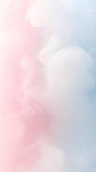 dreamy abstract background features soft, whimsical wisps of white and grey smoke swirling against a gradient of pastel pink on the left flowing into a light blue on the right photo
