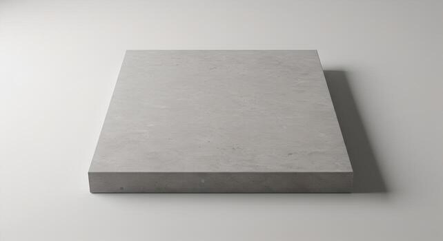 Square concrete slab with matte texture and soft shadows, ideal for minimalist design or branding mockups. photo