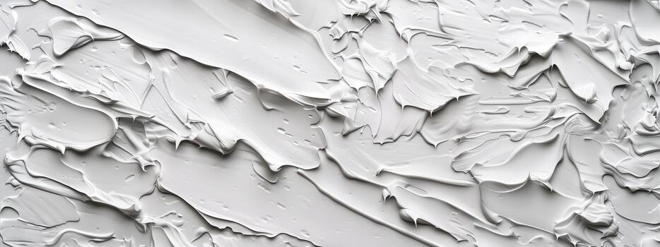 The wall covered in cracks and holes, giving it a rough and unfinished appearance. The texture of the wall is uneven and jagged, with no clear pattern or design. Scene is one of neglect and decay photo