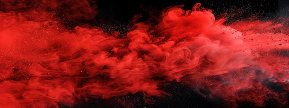 A red cloud of smoke with a black background photo
