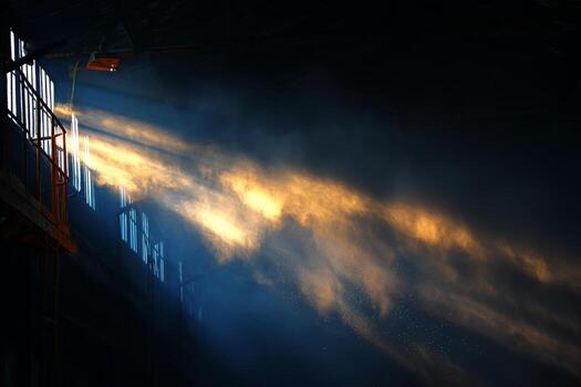 A light shines through a window in a dark room photo
