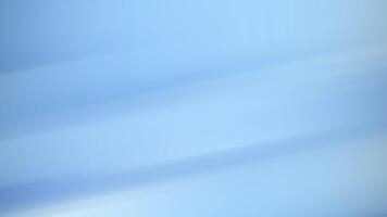 Light blue gradient abstract background with diagonal smooth streaks, minimal design, and soft tones, ideal for modern presentations, digital branding, and elegant creative projects. video