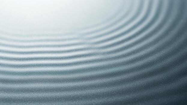 A wave pattern on a surface with a light source photo